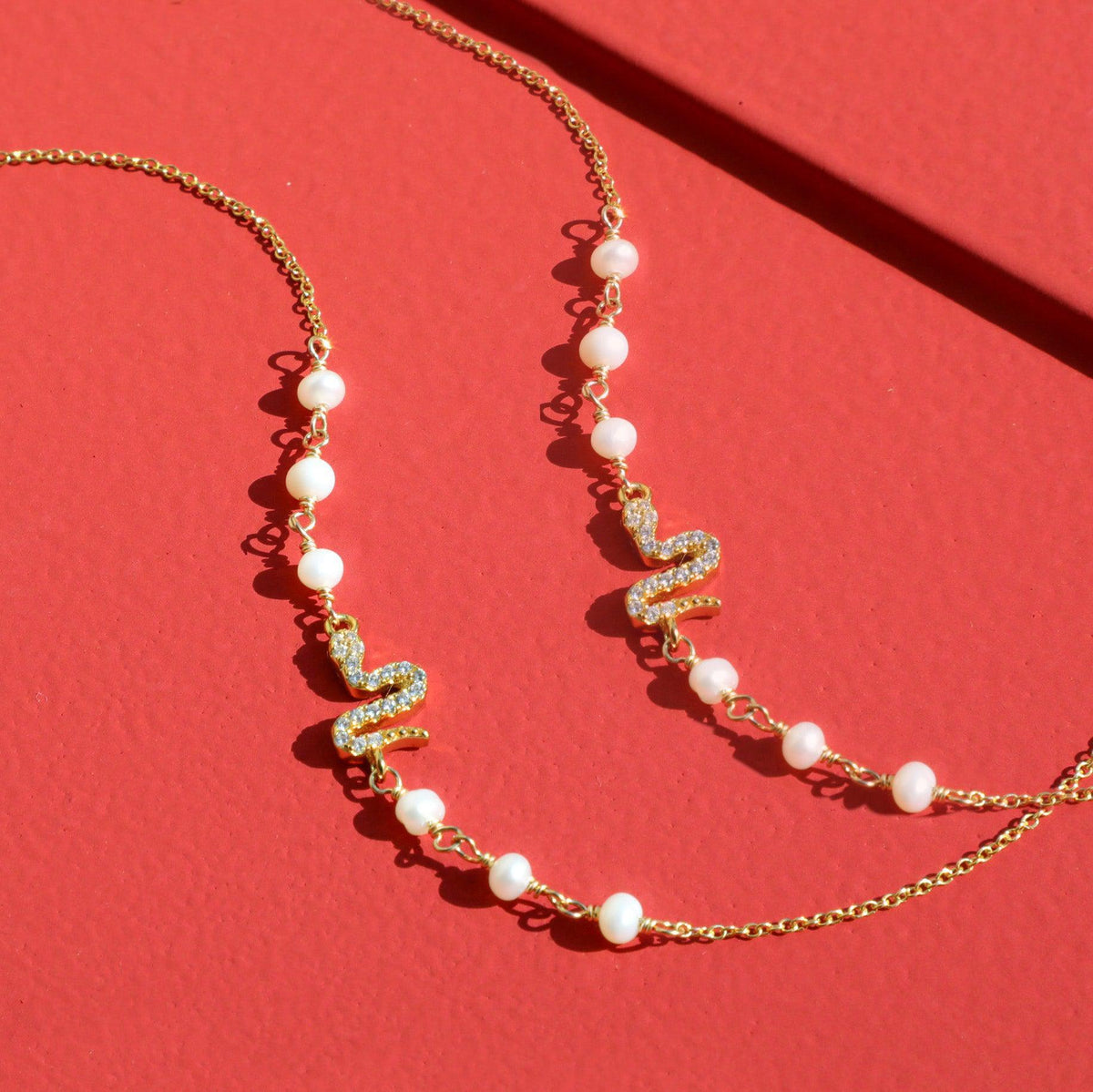 Serpent’s Whisper Pearl Bracelet