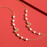 Serpent’s Whisper Pearl Bracelet