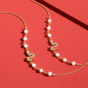 Serpent’s Whisper Pearl Bracelet