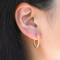 Twist of Gold Hoop Earrings