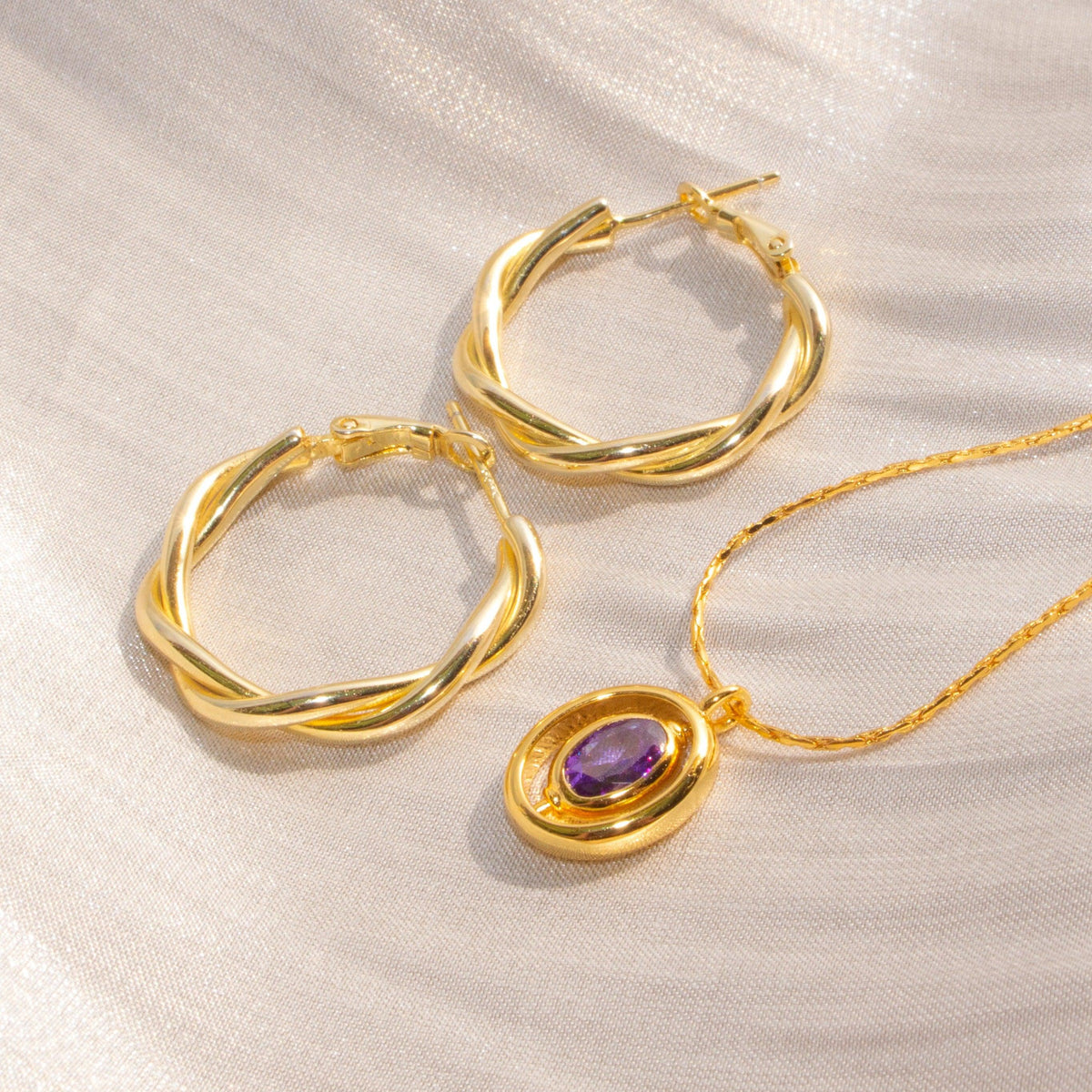 Intertwine Huggie Earrings