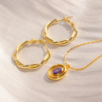 Intertwine Huggie Earrings