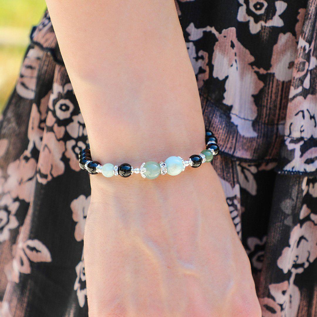 Beaded bracelet fastened with sterling silver worn on a wrist