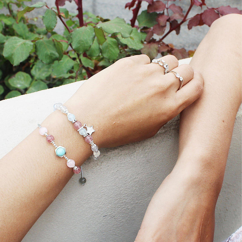 Beaded bracelets and dainty rings